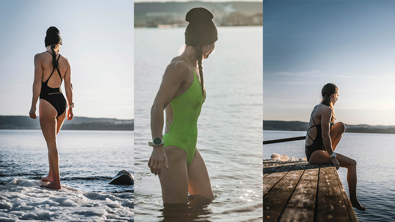 Kvinna med mössa och Power Woman baddräkt