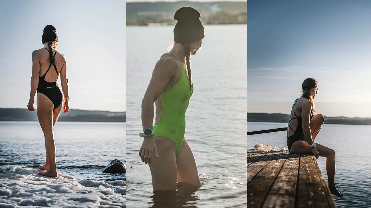 Kvinna med mössa och Power Woman baddräkt